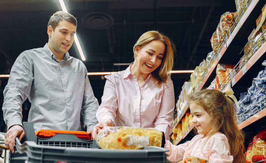 A family shopping for groceries, amidst food inflation as well as housing.