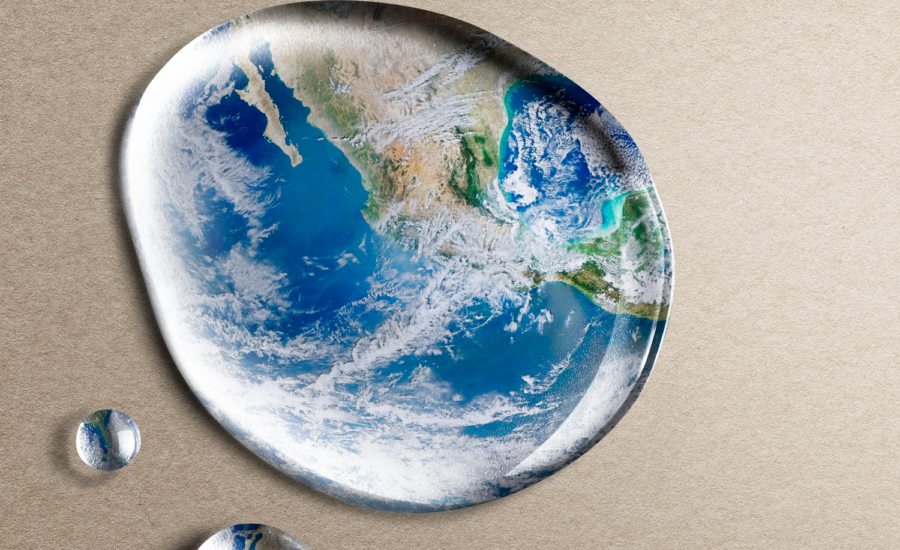 Artistic image of the earth magnified in a drop of water