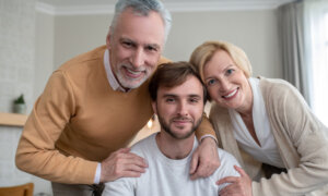 Son moves into rental condo that he owns with his parents. They wonder if they owe capital gains.