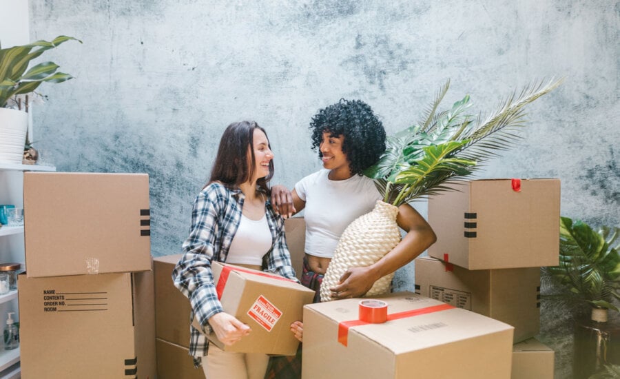 Two roommates moving in together, discussing whether to get a loan for first-and-last-month rent