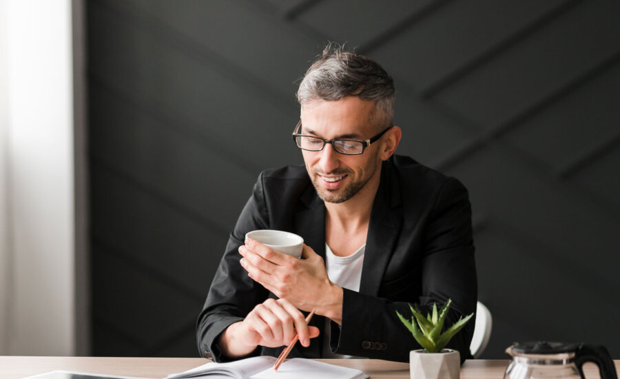 A man reading a course about retirement planning