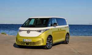 A white and yellow VW ID Buzz van sits on a dock