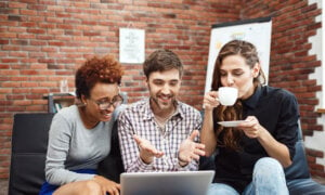 Three Canadians so happy that they just filed their 2023 income tax return