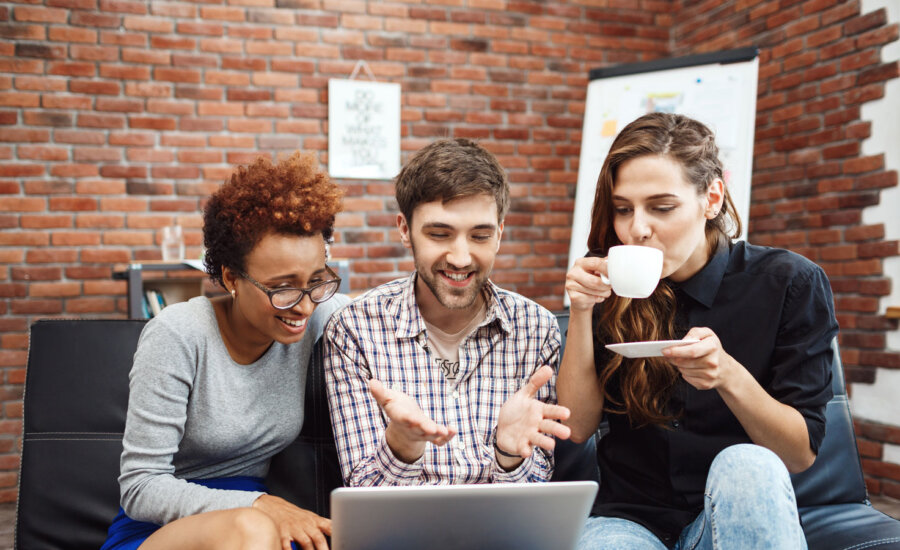 Three Canadians so happy that they just filed their 2023 income tax return