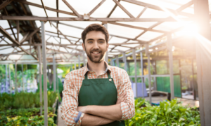 A young man working in a garden centre