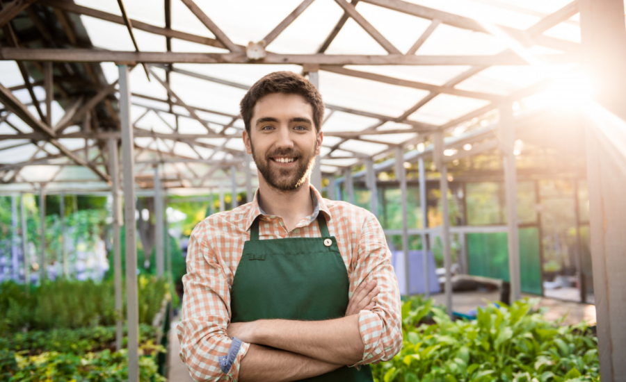 A young man working in a garden centre