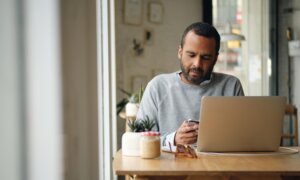 A man works from his home office