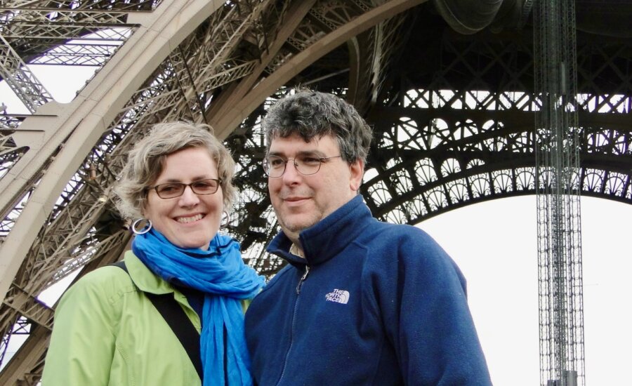 Authors Julie Barlow and Jean-Benoit Nadeau in front of the Eiffel Tower
