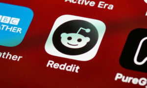 Reddit app icon on a phone, as Reddit moderators are able to buy its stocks as part of IPO