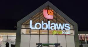 A Loblaw storefront lit up at night