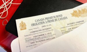 A Canada Premium Bond on a desk
