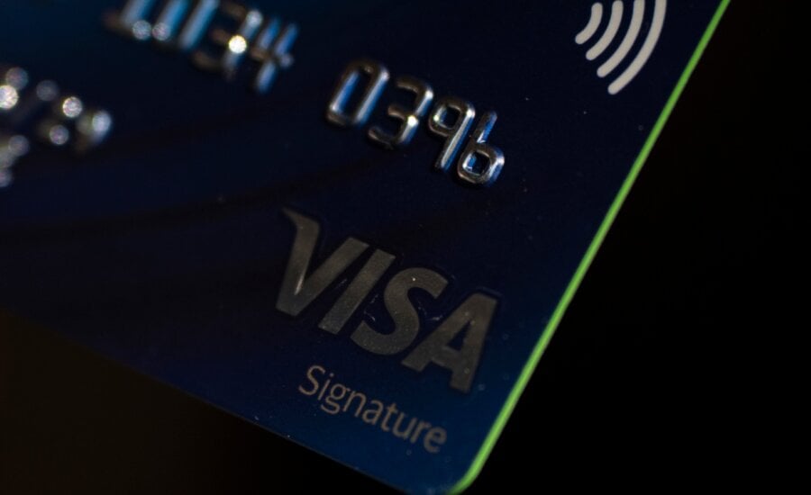 A Visa card is seen in Portland, Ore.,