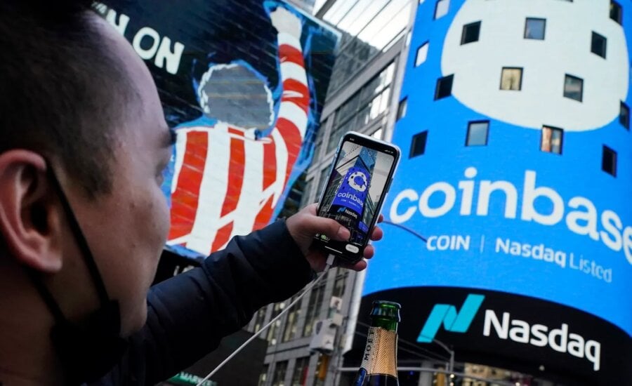 The Coinbase logo covers the Nasdaq MarketSite in New York's Times Square, April 14, 2021.