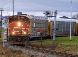 A CN Rail locomotive pulls auto carrier cars in Dartmouth, N.S. on Thursday, Nov. 25, 2021.