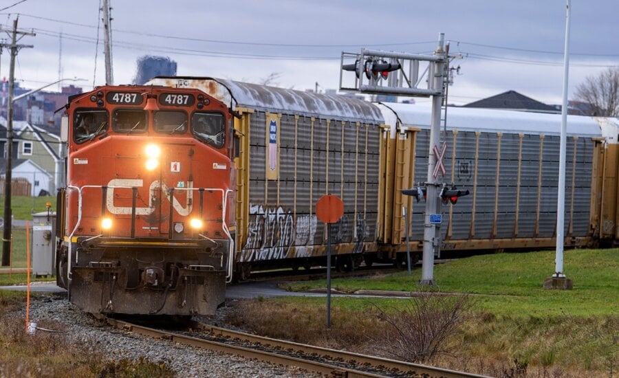 A CN Rail locomotive pulls auto carrier cars in Dartmouth, N.S. on Thursday, Nov. 25, 2021.