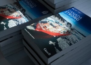 The federal budget is seen available for distribution on tables in Ottawa, Tuesday, Nov. 4, 2025.