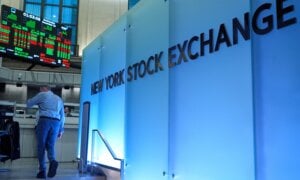 Traders work on the floor at the New York Stock Exchange in New York, Wednesday, Dec. 10, 2025.