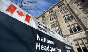 The Canada Revenue Agency sign outside the National Headquarters at the Connaught Building in Ottawa is seen on Monday, March 1, 2021.