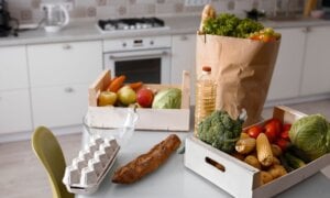 Groceries sitting on a kitchen counter