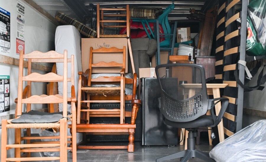 A truck packed with furnishings and belongings is shown on Quebec's unofficial moving day in Montreal, Tuesday, July 1, 2025.