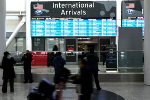 Passengers arrive at Pearson International Airport in Toronto on Wednesday, Feb.11, 2026.
