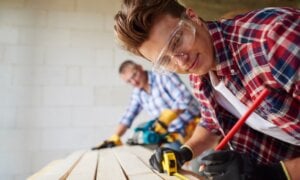 Young carpenter is creating something new