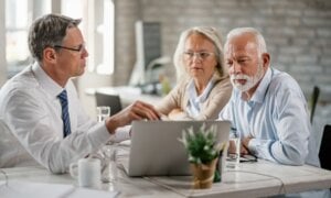 Senior couple meeting with their financial planner