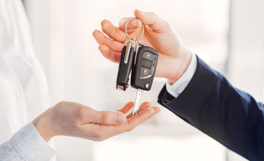 Handing over the keys to a new car