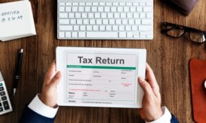 Income Tax Return Deduction Refund Concept