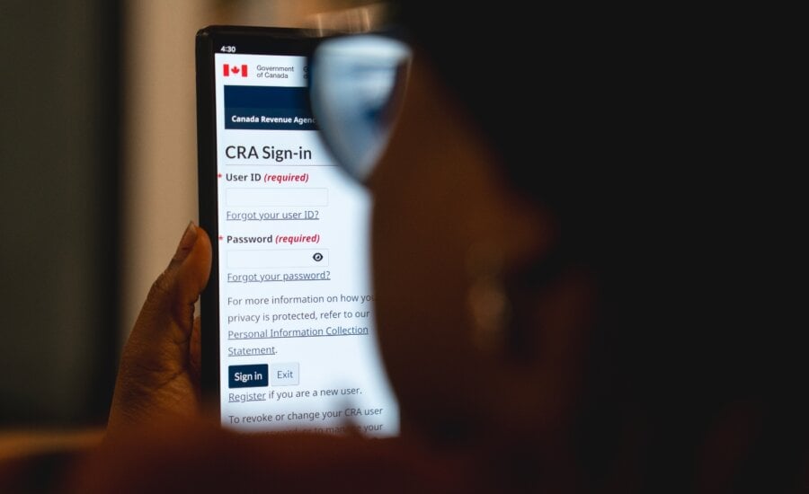 A person looks at the Canada Revenue Agency MyCRA login screen in a photo illustration in Toronto, Saturday, Feb. 28, 2026. THE CANADIAN PRESS/Giordano CiampiniA person looks at the Canada Revenue Agency MyCRA login screen in a photo illustration in Toronto, Saturday, Feb. 28, 2026.