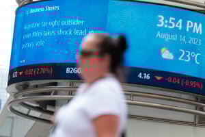 A Bank of Montreal (BMO) electronic ticker showing the stock prices of certain commodities is seen in the Financial District of Toronto, Aug. 14, 2023.