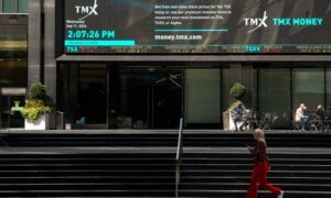 A person walks past the TMX Market Centre in Toronto, Wednesday, Sept. 11, 2024.