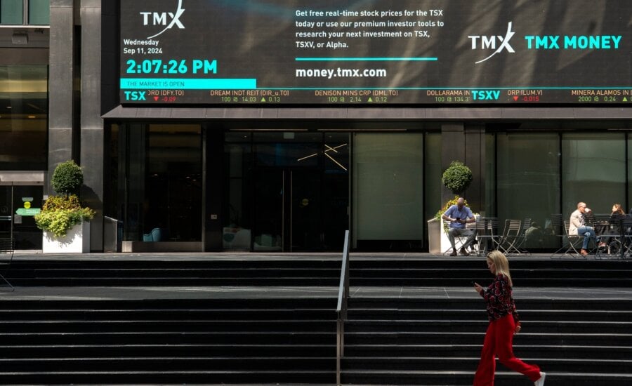 A person walks past the TMX Market Centre in Toronto, Wednesday, Sept. 11, 2024.