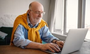 Senior man at a laptop