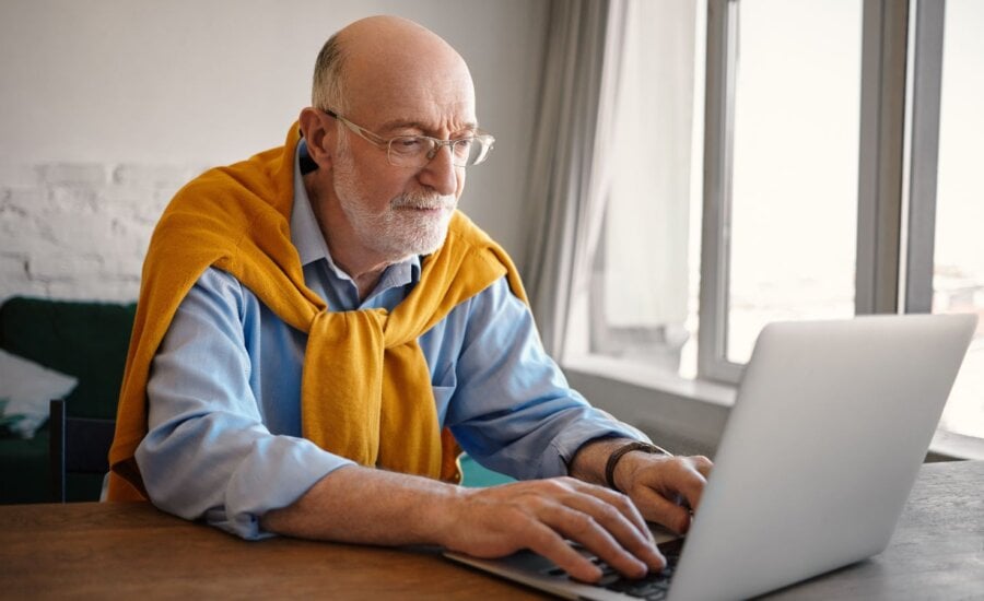 Senior man at a laptop