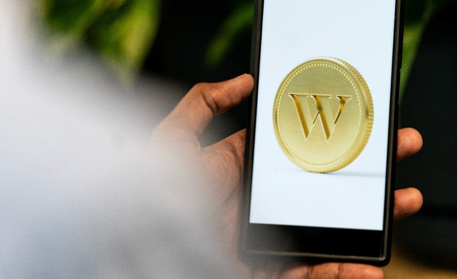An app screenshot for Wealthsimple is seen on a smartphone in a photo illustration made in Toronto, Monday, June 17, 2024.