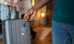 Airbnb host holding house keys