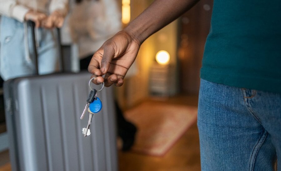 Airbnb host holding house keys