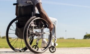 Man in a wheelchair in a park
