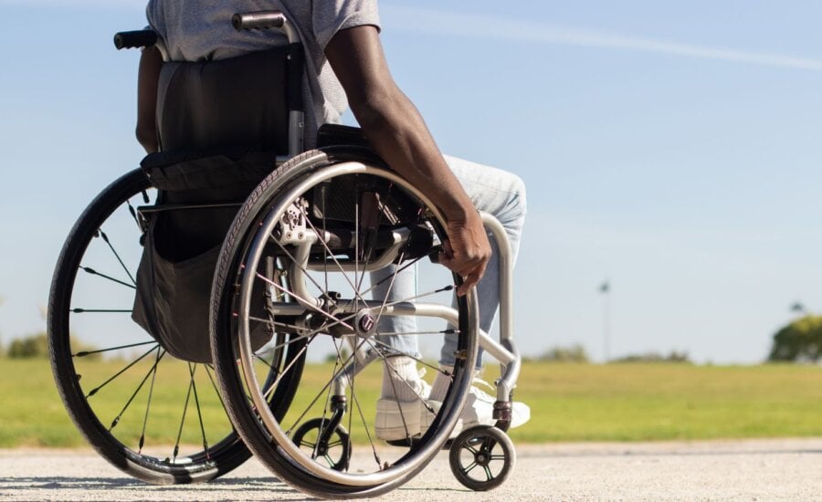 Man in a wheelchair in a park