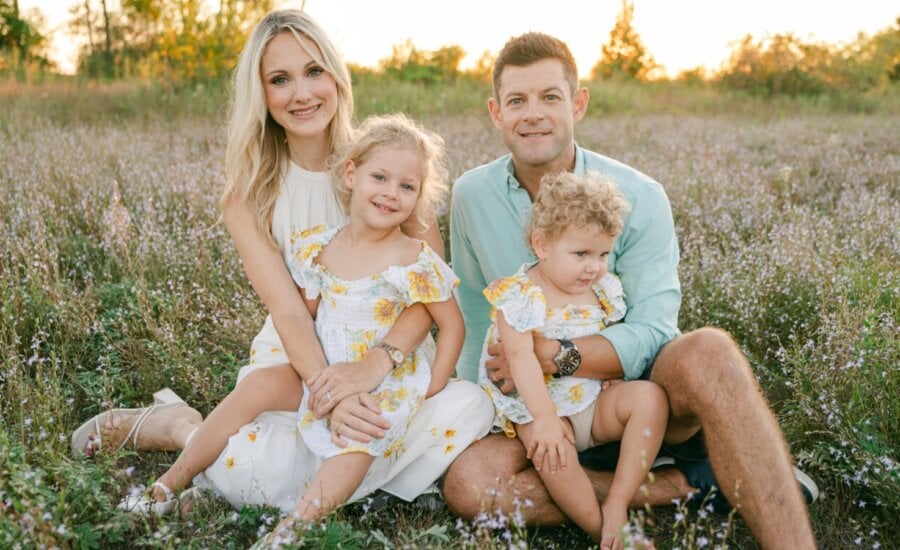 Erin Bury, left, and Kevin Oulds are pictured in this undated handout photo with daughters Emilia, left, and Olivia.