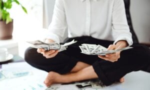 Person holding a lot of cash