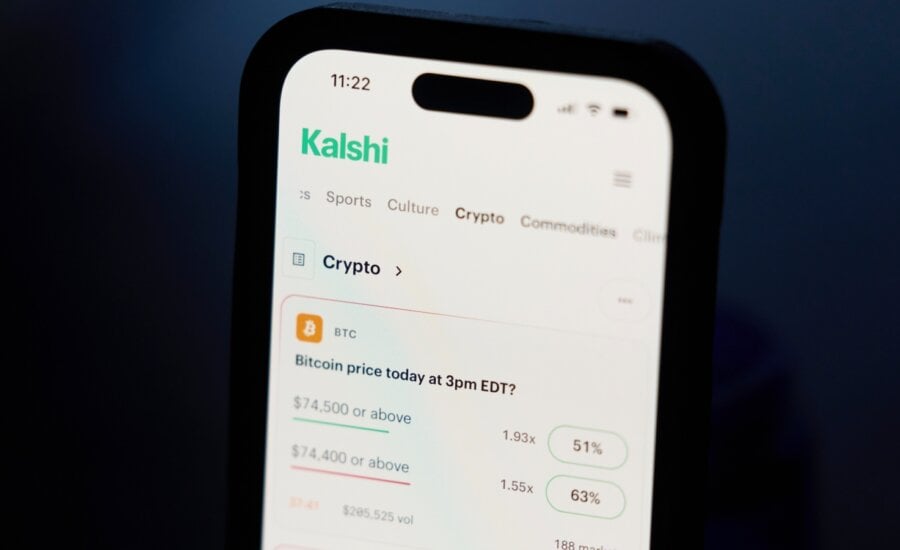 A phone displays crypto trades on Kalshi on Thursday, April 16, 2026, in Portland, Ore.