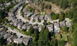 Houses are seen in a neighbourhood on the side of a mountain, in Maple Ridge, B.C., on Thursday, Aug. 17, 2023.