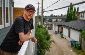 Calgary resident Eugene Blanchard, who built a laneway home for his daughter and son-in-law, shows off the home in Calgary, Tuesday,