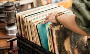 Woman looking through records