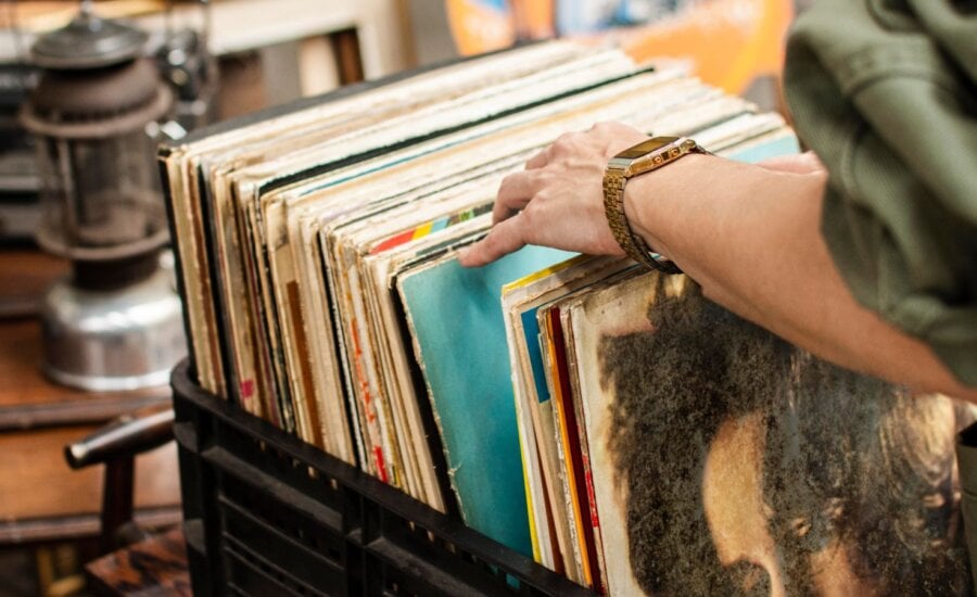 Woman looking through records