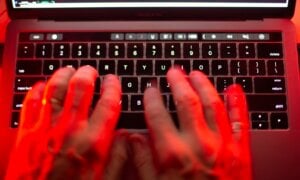 A man uses a computer keyboard in Toronto in this Sunday, Oct. 9, 2023 photo illustration. The First Nations Health Authority in B.C. is investigating after being hit by a cybersecurity attack.T