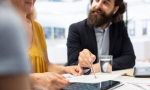 Man and woman working at a table