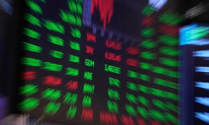 A board above the trading floor of the New York Stock Exchange is shown in this image, Tuesday, July 1, 2025.